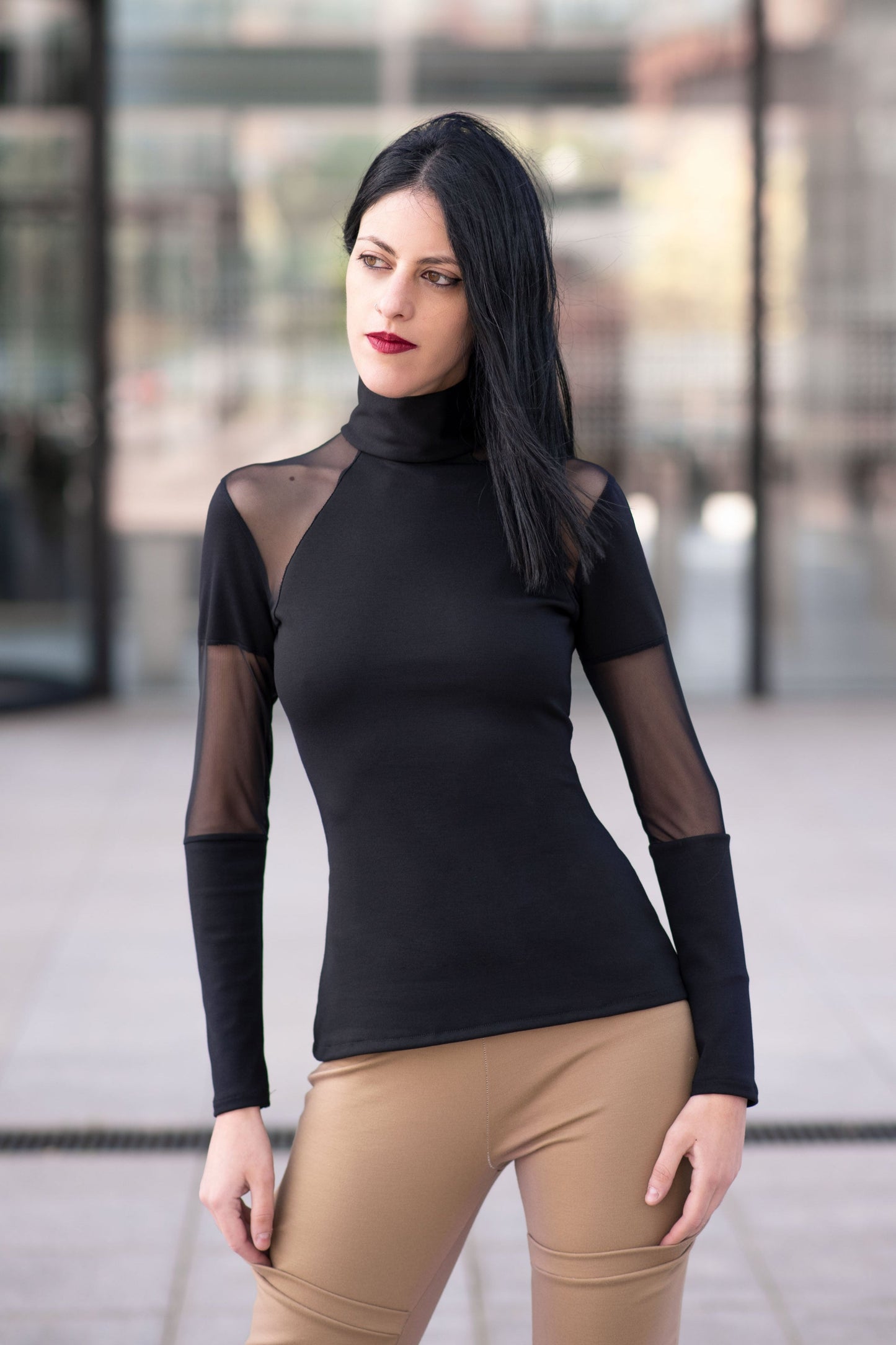 Black sleeve top with mesh details